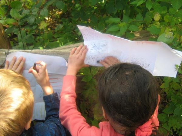 students doing rubbings