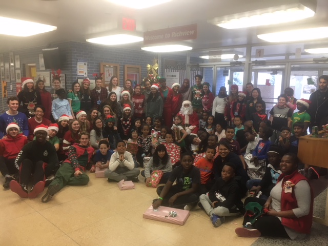 High School and Elementary students with Santa Claus