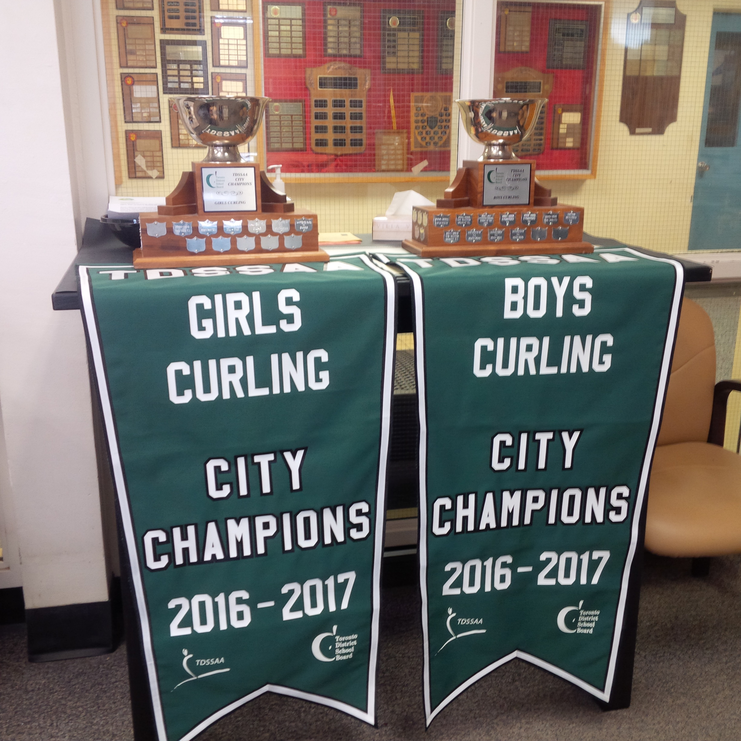 Curling trophies and banners