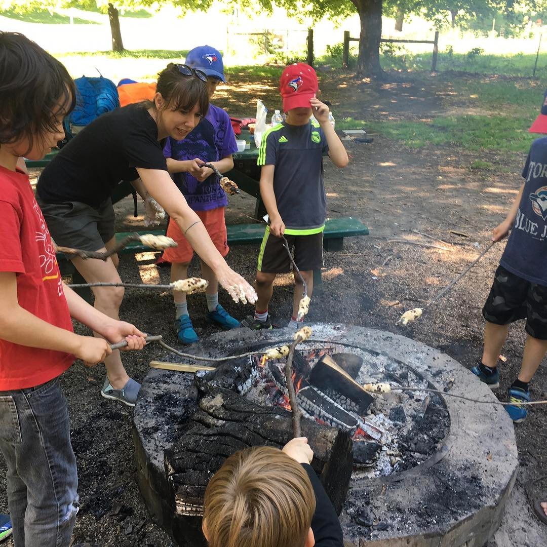 Alicia and her Junior Students, making Bannock in a local park.  Open Gallery