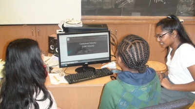 Students using computer Open Gallery