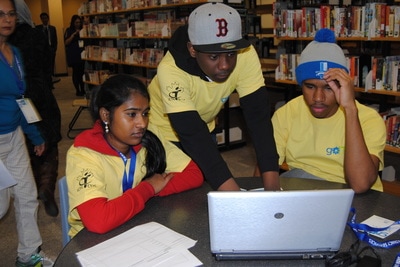Students using laptop Open Gallery
