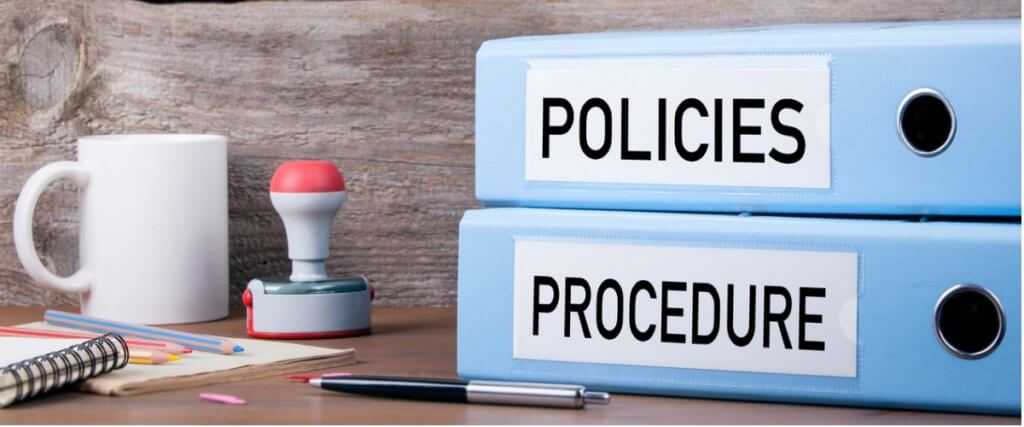 policies-and-procedure-two-binders-on-desk-picture-id621493052-1024x427 policies nd procedure two binders on desk picture