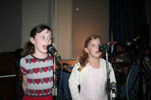 two students singing