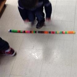 student measuring 