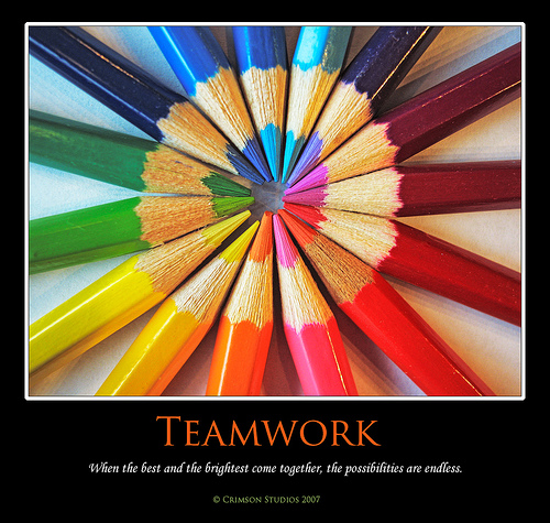 Teamwork graphic featuring pencil crayons od many colours