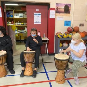 Students playing musical instrument