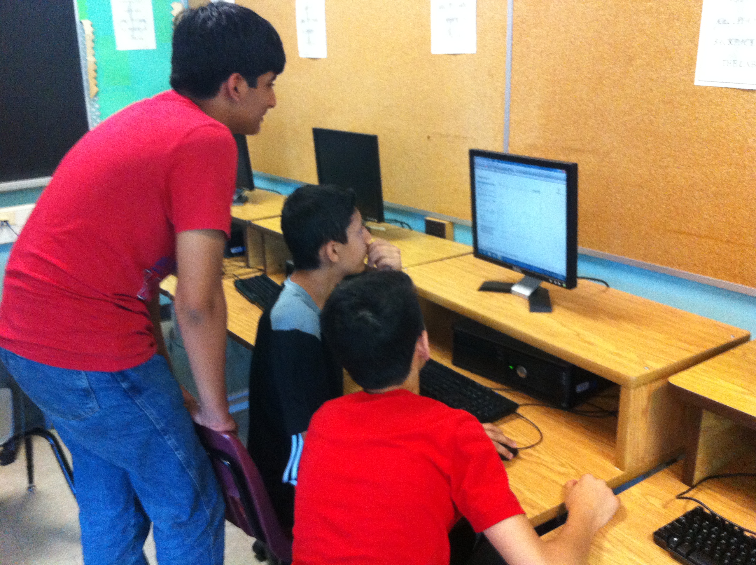 Picture of students using computer simulations