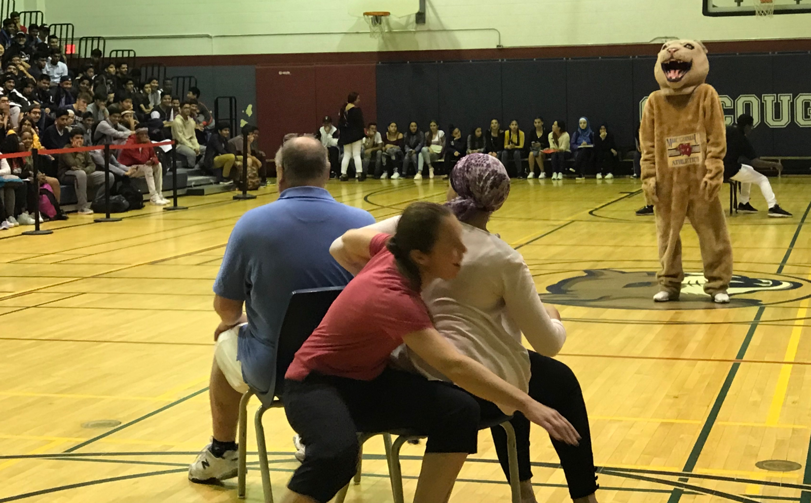 Photo of teachers playing musical chairs