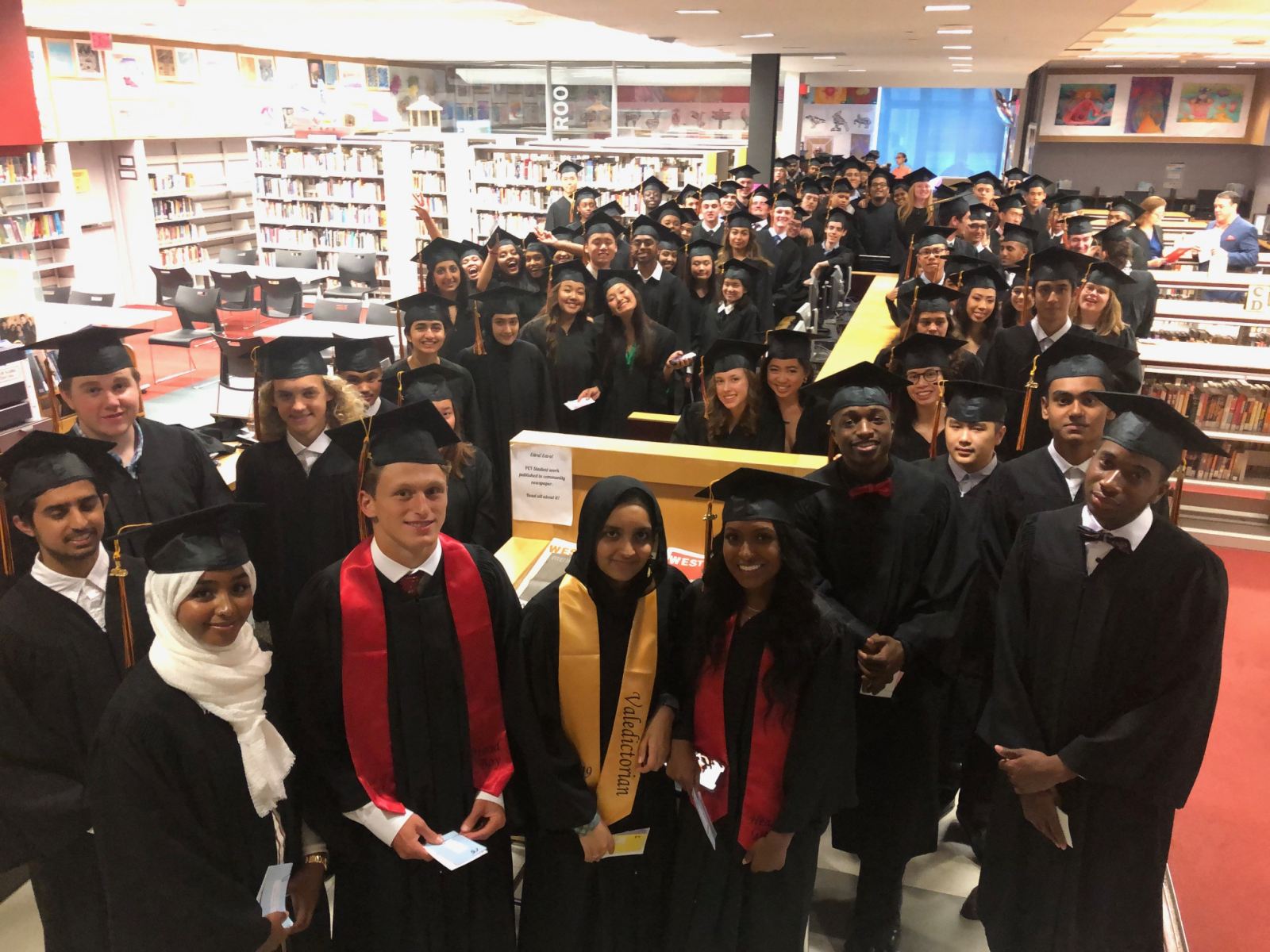 Graduates marshal in the Library for Commencement 2019